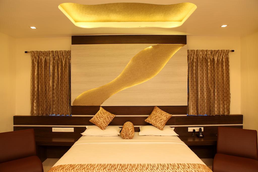 Hotel Sbs Grand Kójamputtúr Pokoj fotografie